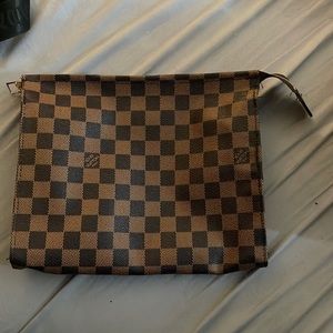Lv clutch style bag no straps